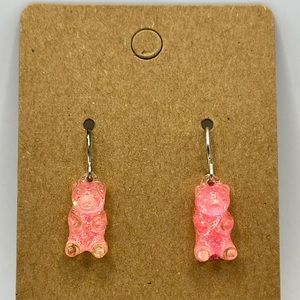 Shiny pink gummy bear dangling earrings